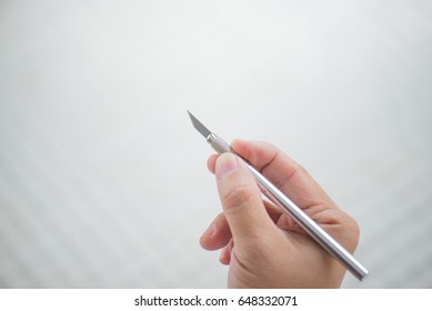 Hand Holds Craft Knife