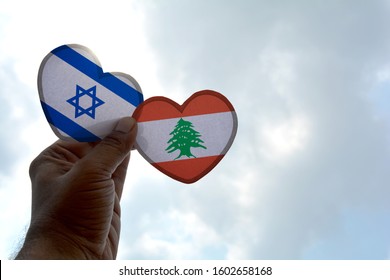 Hand Holds A Heart Shape Israel And Lebanon Flag, Love Between Two Countries