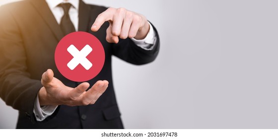 Hand holds icon,cancellation symbol,cancel icon.Cross mark flat red icon.round X mark.cancel button.Wrong.cross mark rejection.Declined.On grey background.Banner.Copy space.Place for text