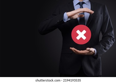 Hand holds icon,cancellation symbol,cancel icon.Cross mark flat red icon.round X mark.cancel button.Wrong.cross mark rejection.Declined.On dark background.Banner.Copy space.Place for text - Shutterstock ID 2194193535
