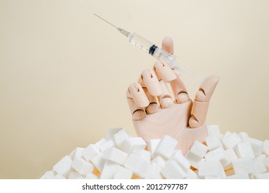 Hand holds insulin syringe. Diabetes awareness day.November 14. Insulin resistance. Sugar free. - Powered by Shutterstock