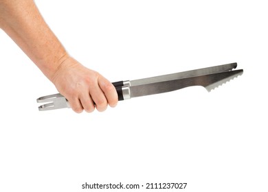 A hand holds a kitchen tong. Isolated on white background. Close-up.