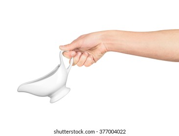 Hand Holds White Gravy Boat Isolated On White Background