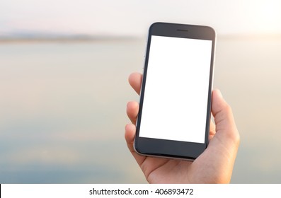 hand holing phone white screen at outdoor lifestyle - Shutterstock ID 406893472