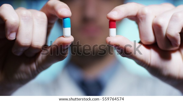 hand of a hospital
medical expert shows the pill to be taken to his patient. concept
of generical pills