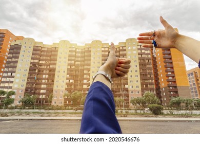 Hand With House Keys The Second Hand Shows The Class, The Concept Of Buying A Home.