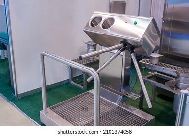 Hand Hygiene Station With Turnstile Gate And Sanitizer Before Entering Production Area. Infection Prevention, Disinfection, Industrial, Covid 19, Coronavirus Concept