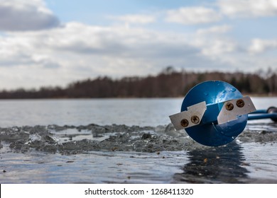 Hand Ice Auger On The Ice
