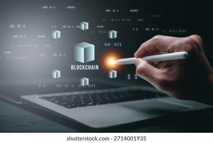 A hand interacting with a digital blockchain interface above a laptop, representing blockchain technology, decentralized network, data security, and modern financial innovation.