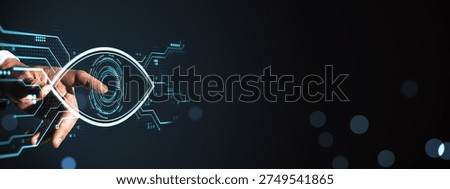 Hand interacting with digital eye interface in futuristic tech style on dark background, concept of computer vision and technology