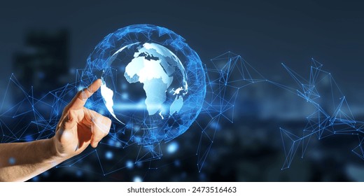 A hand interacting with a digital globe overlay on a city background, illustrating a connectivity concept