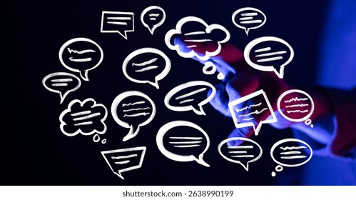 Hand interacting with digital speech bubbles