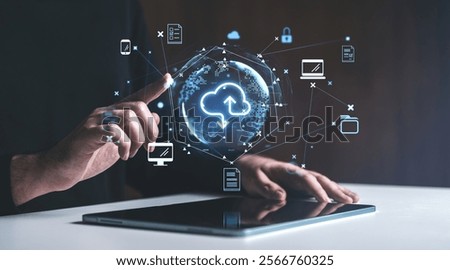 Hand interacting with a glowing cloud storage icon surrounded by digital symbols, futuristic dark background, concept of data storage