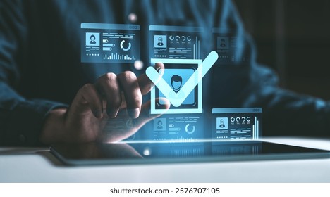 Hand interacting with holographic interface displaying user identity and data verification, glowing in blue tones, concept of secure KYC verification