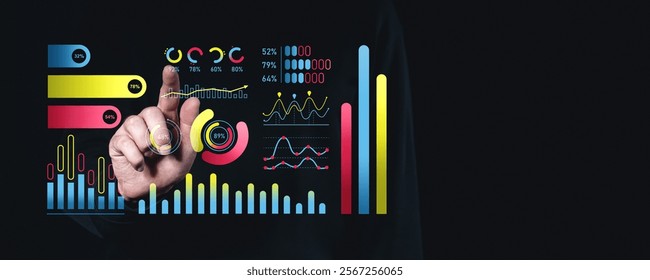 Hand interacting with vibrant digital charts and graphs on dark background, showcasing data analysis and business management concepts
