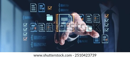 A hand interacts with a digital document management interface, featuring transparent icons on a dark background, illustrating data organization and digital workflow concepts