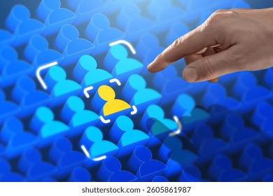 A hand interacts with a digital interface highlighting a unique candidate among many. The concept represents recruitment, HR, personal selection, and artificial intelligence in hiring