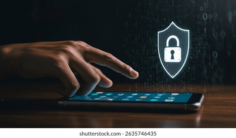 A hand interacts with a phone, activating a security shield. Concept of digital protection and data privacy in a cyber world. Modern, dark setting. - Powered by Shutterstock - Get 15% off with code: PIKWIZARD15