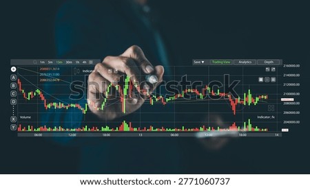 A hand interacts with a transparent trading screen displaying detailed financial charts and stock market data.
