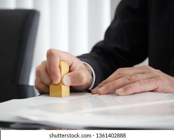 Hand Of A Judicial Scrivener Who Puts A Mark