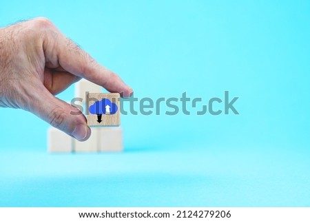 hand keep cube with symbol cloud download. Cloud computing technology, upload and download files concept.