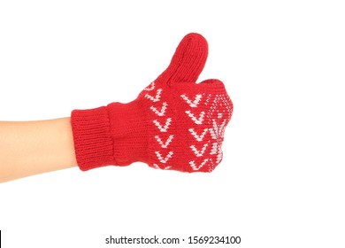 Hand In Knitted Mitten Showing Thumb Up On White Background