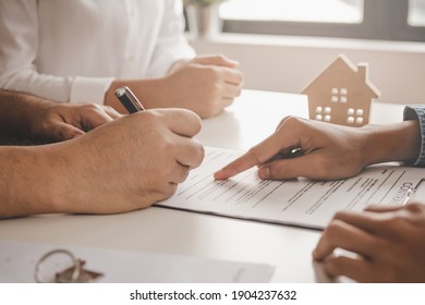 Hand Of Landlord, Realtor Pointing Sign Signature Contract Rental, Purchase, Buyer Home Or Apartment With Tenant, Client After Banker Agreement Mortgage, Loan Success Or Done. Property Agent Concept.