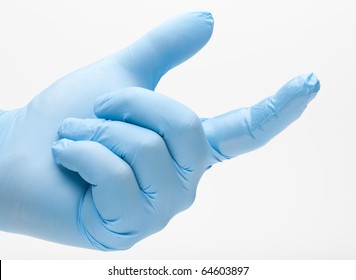 Hand With Lubricated Finger. Could Illustrate A Doctor About To Administer A Prostate Exam.