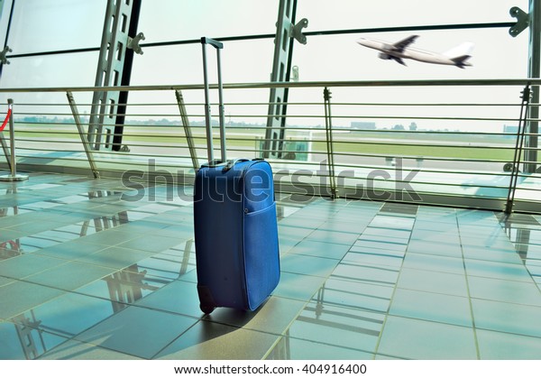 hand luggage forgot\
at the airport lobby