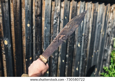 Hand with machete
