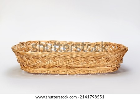 Hand made bamboo basket isolated on white. Woven from bamboo tray.