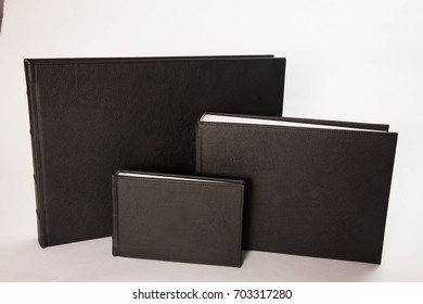 Hand Made Fine Art Photo Wedding Albums Of Different Sizes With Custom Sleeve Covers.  Leather Book Binding Comes In All Types And Shapes.