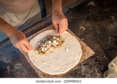 Hand Made Fresh Organic Vegan Pizza On Wooden Table