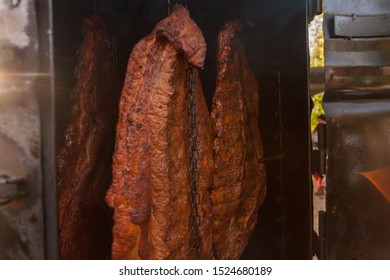 Hand Made Meat Smoker With Pork Ribs Cooking.