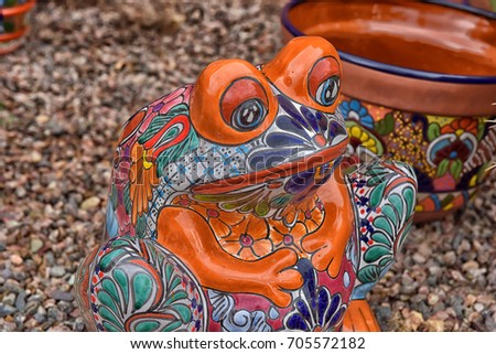 Hand made and painted colored pottery for sale at local street market