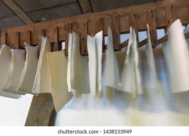 Hand Made Paper Is Hanging In An Old Paper Mill For Drying