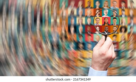Hand with magnifying glass searching human resources among diverse business people as career and team concept - Shutterstock ID 2167341349