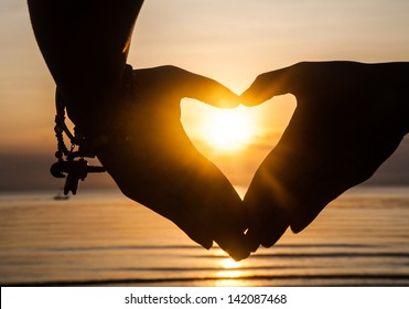 Hand Make Heart With Sunset