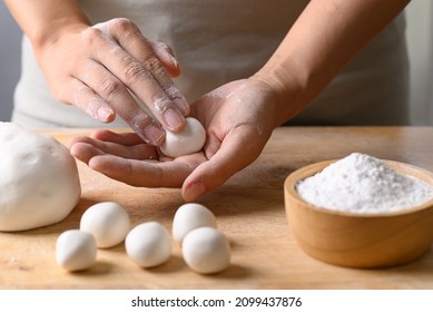 Hand making Tangyuan, Chinese dessert made of ball glutinous rice flour