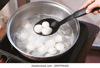 Hand Making Tangyuan, Chinese Dessert Made Of Ball Glutinous Rice Flour In Boiled Water