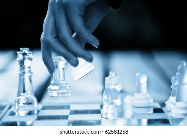 Hand Making A Winning Chess Move