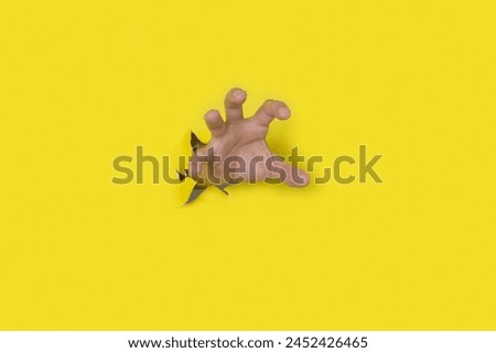 Similar – Image, Stock Photo Male hand comes out of a pile of leaves. Concept fall fun