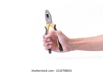 The Hand Of A Man Is Holding A Black Yellow Pliers Isolated On The White Background