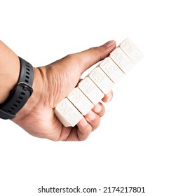 Hand Of Man Holding Medicine Pill Box With Clipping Path Isolated On A Whitebackground.