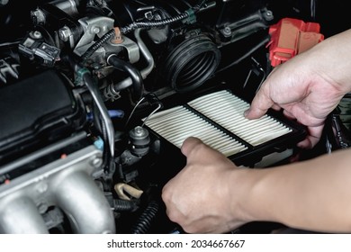 Hand A Man Input New Air Filter Of Car Engine In Engine Room Basic Concept In Maintenance Of A Car 