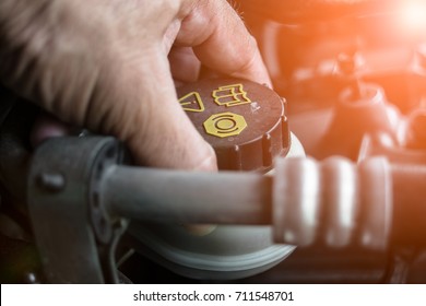 Hand Man Opening To Brake Fluid Tank For Check  - Car Maintenance