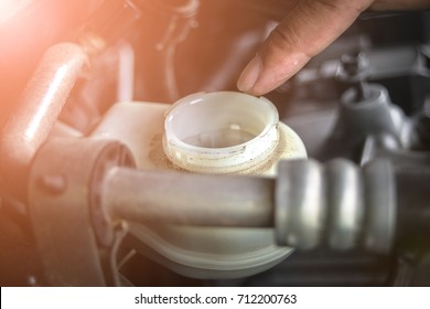 Hand Man Opening To Brake Fluid Tank For Check  - Car Maintenance