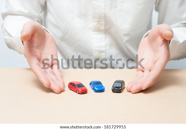 The hand of man to sell a\
car