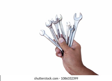 Hand of a man. Hand with a spanner. Instruments. Place for text. Mock up.