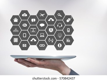 Hand of man using digital tablet with application icon